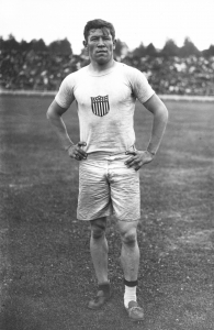 Thorpe with mismatched shoes in the 1912 Olympics